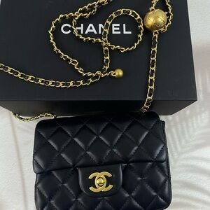 CHANEL Black Quilted Mini Flap Crossbody with Gold Chain